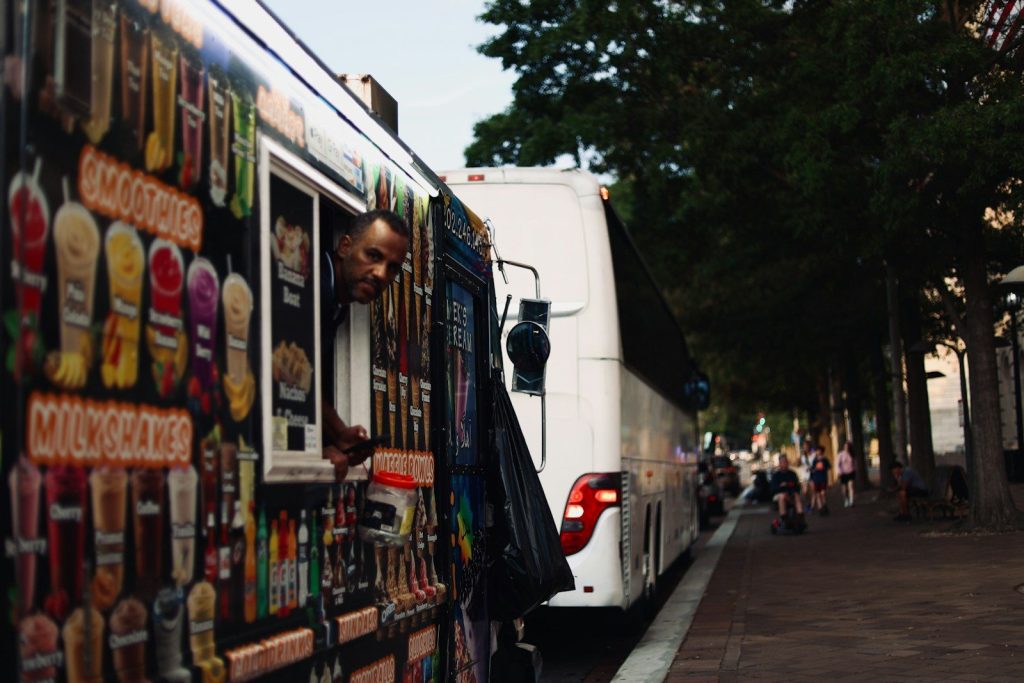A food truck parked on the side of the road