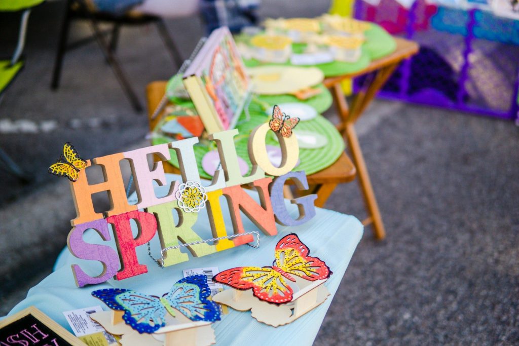 a table with a box of pizza