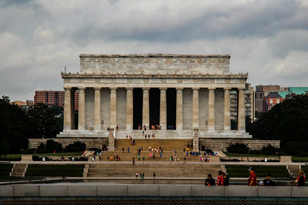 a group of people standing in front of a building